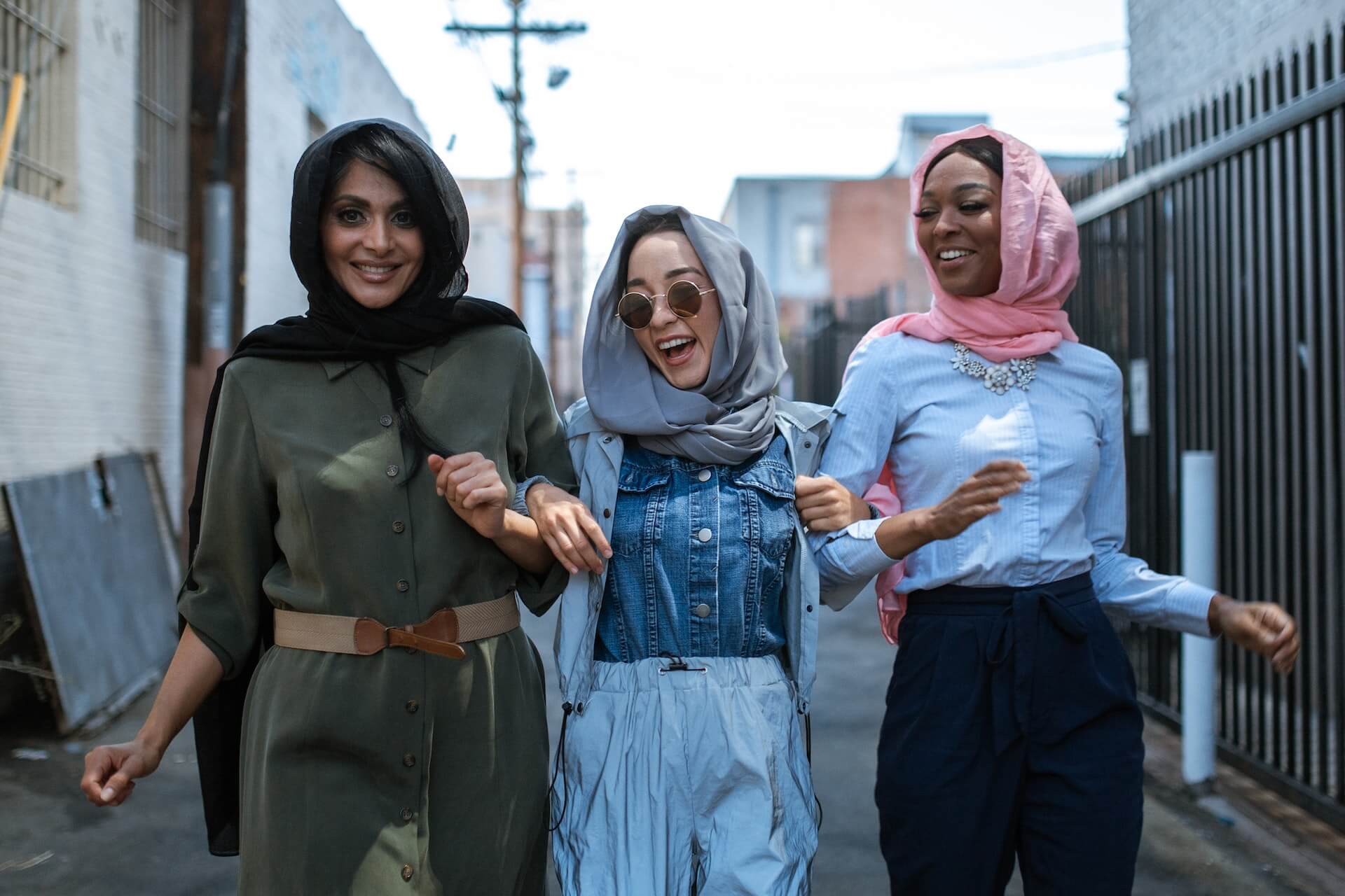 excited women walking on the street