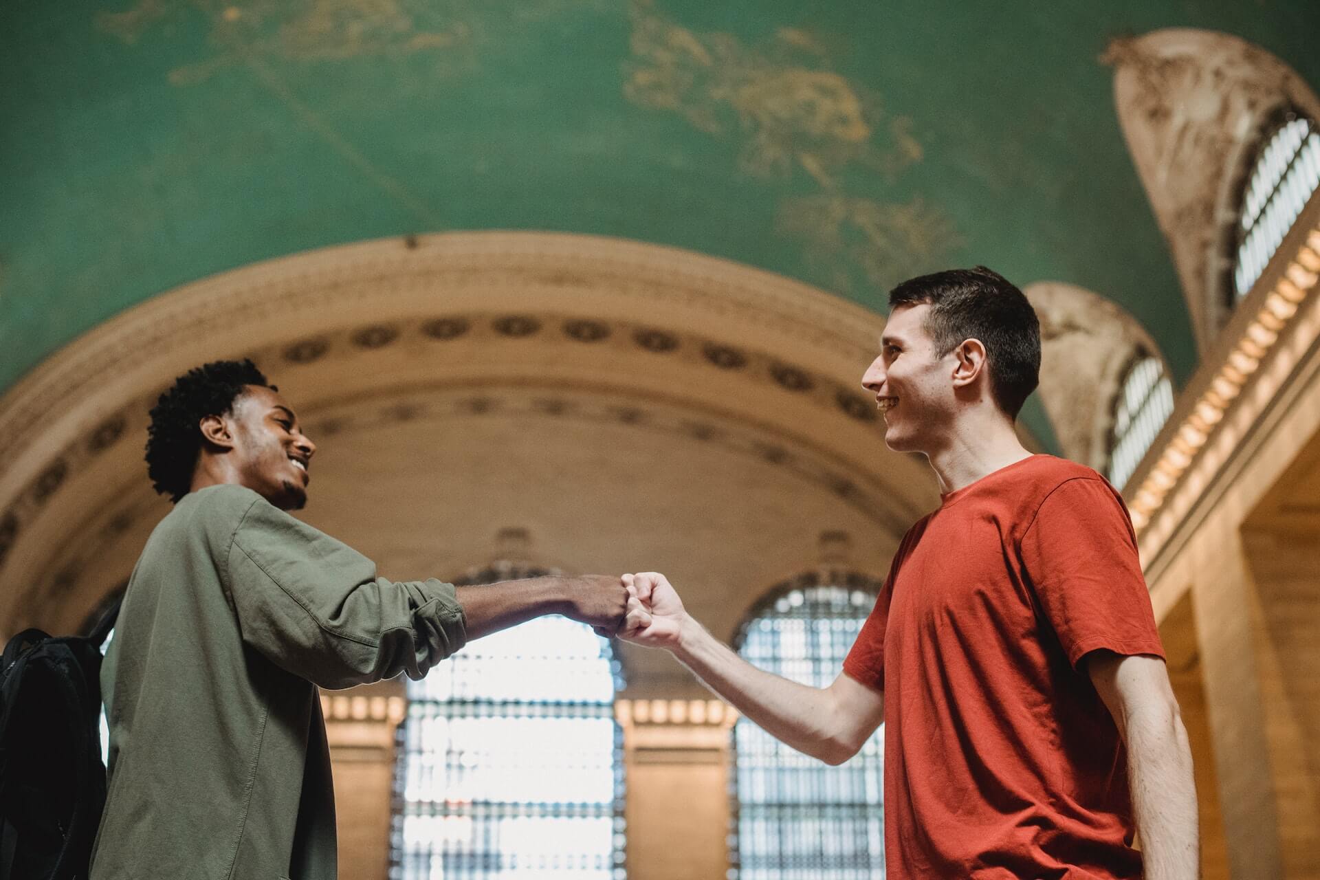 Friends bumping their fists