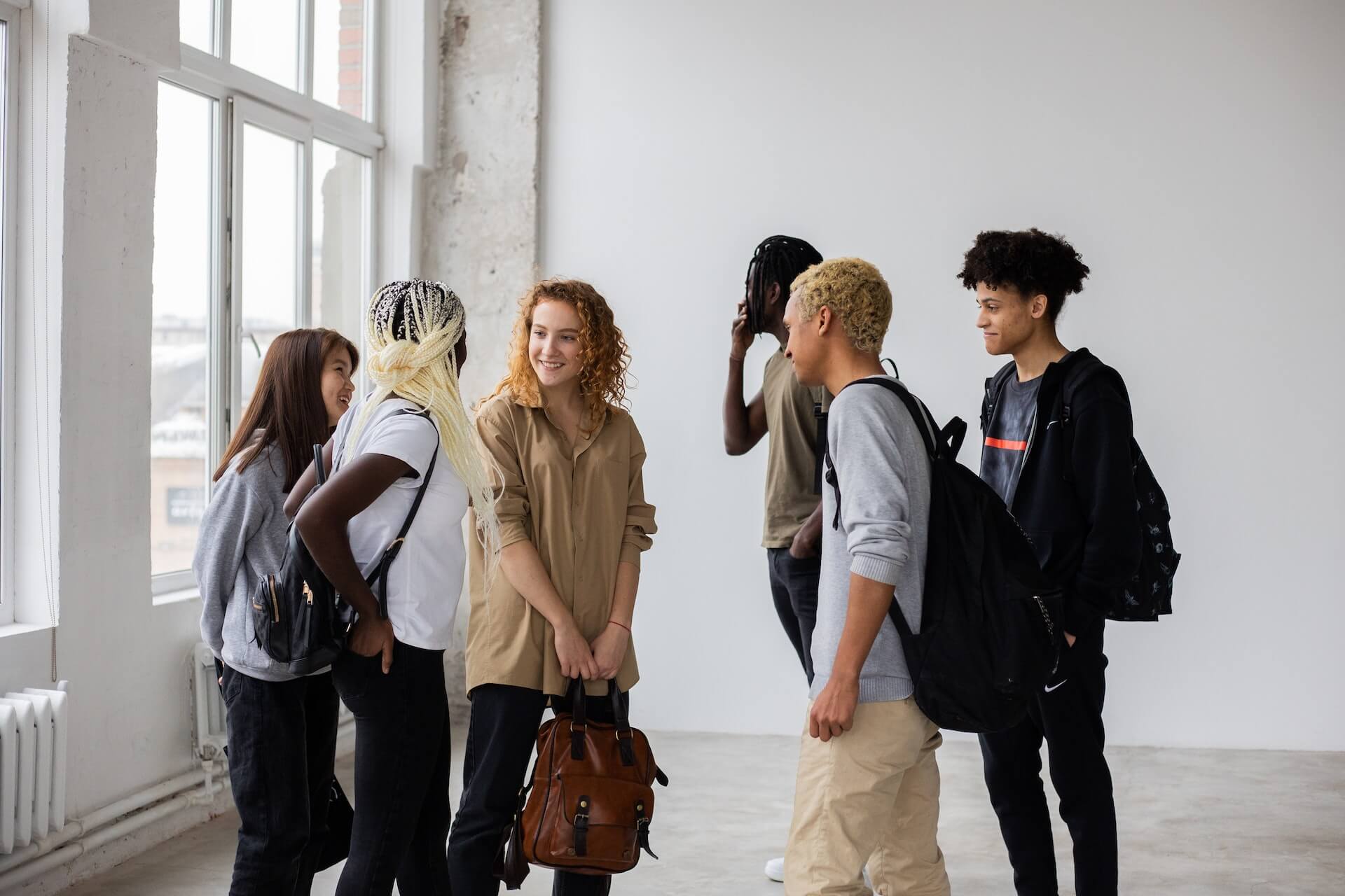 group of young people talking