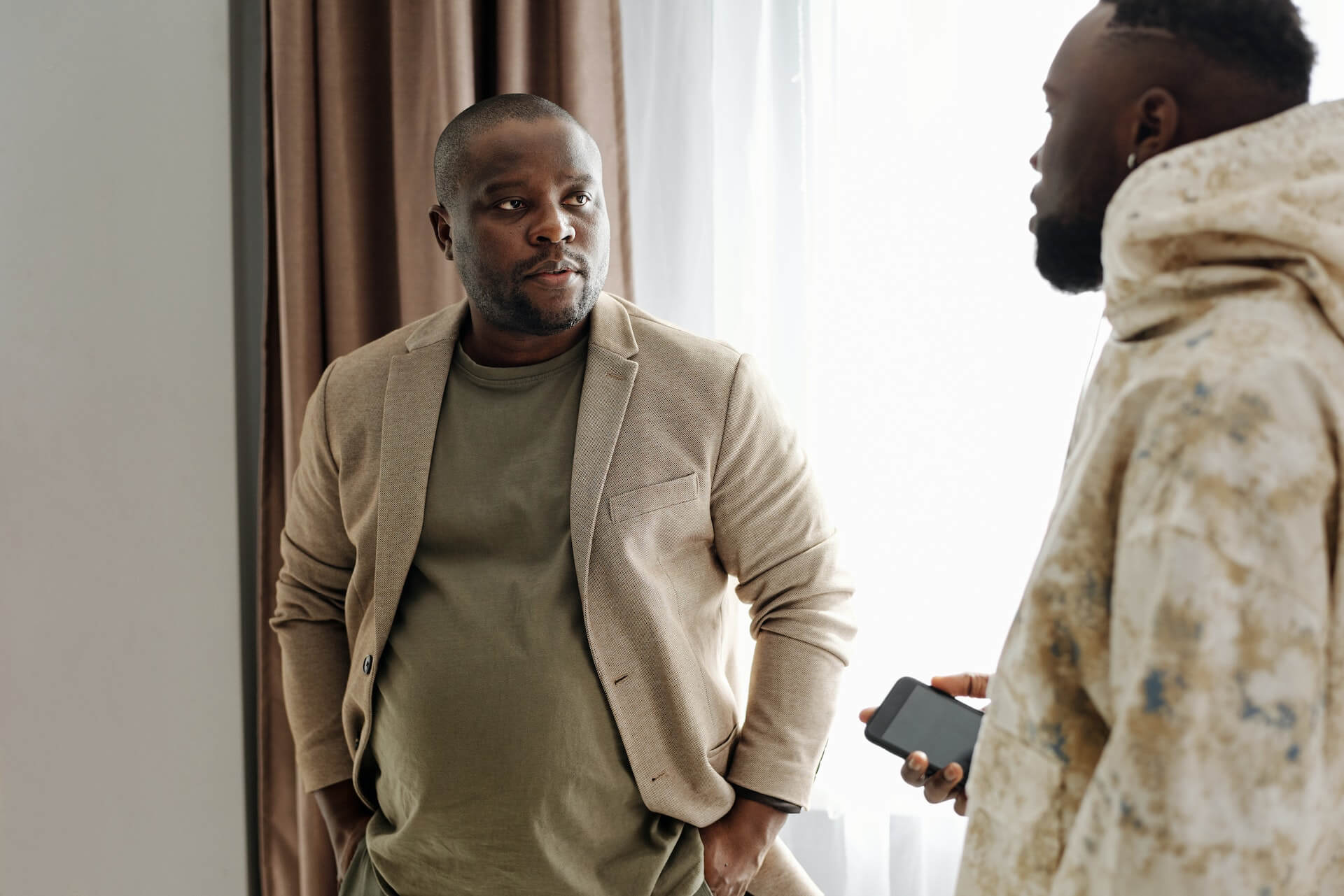 two men speaking