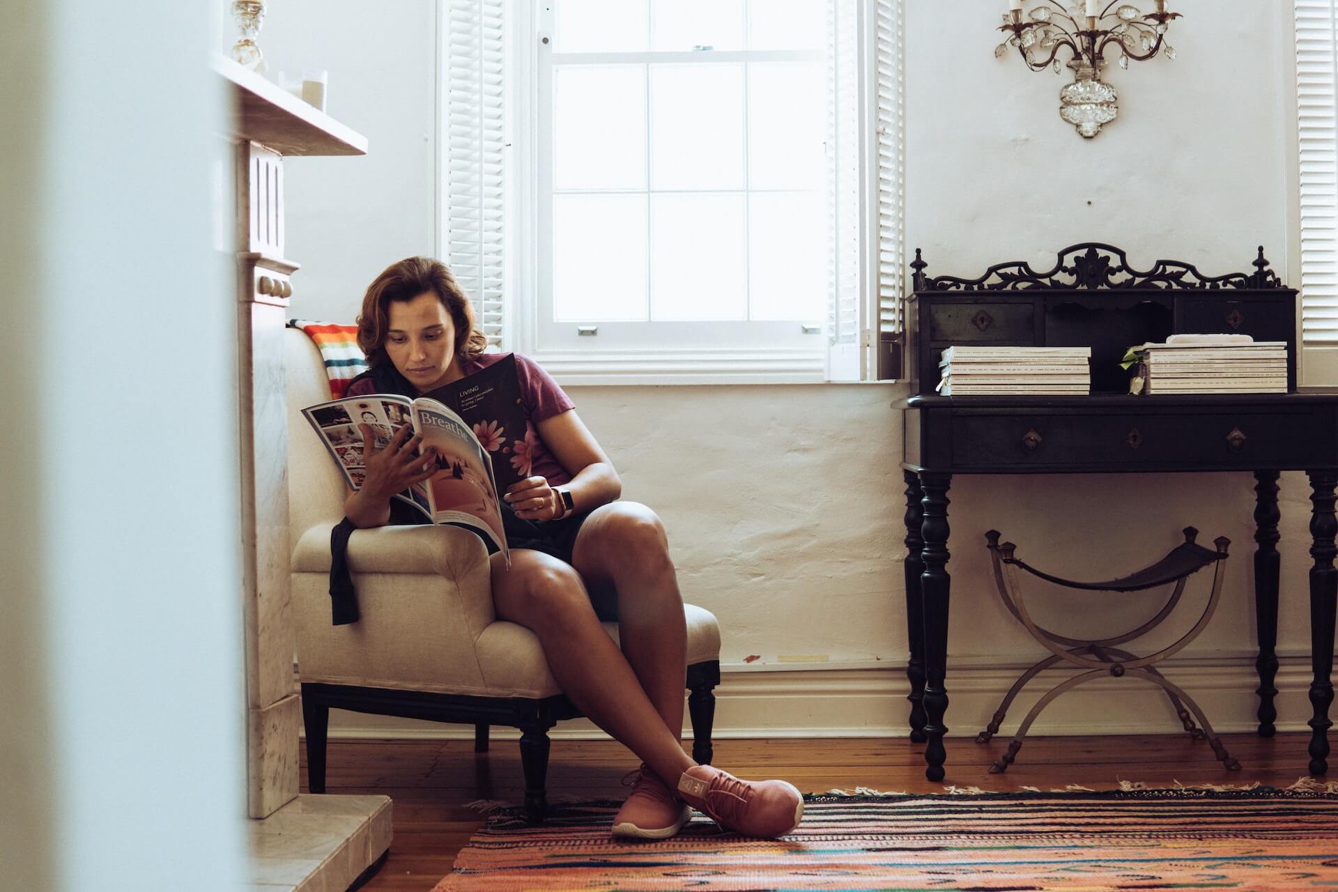woman reading a magazine
