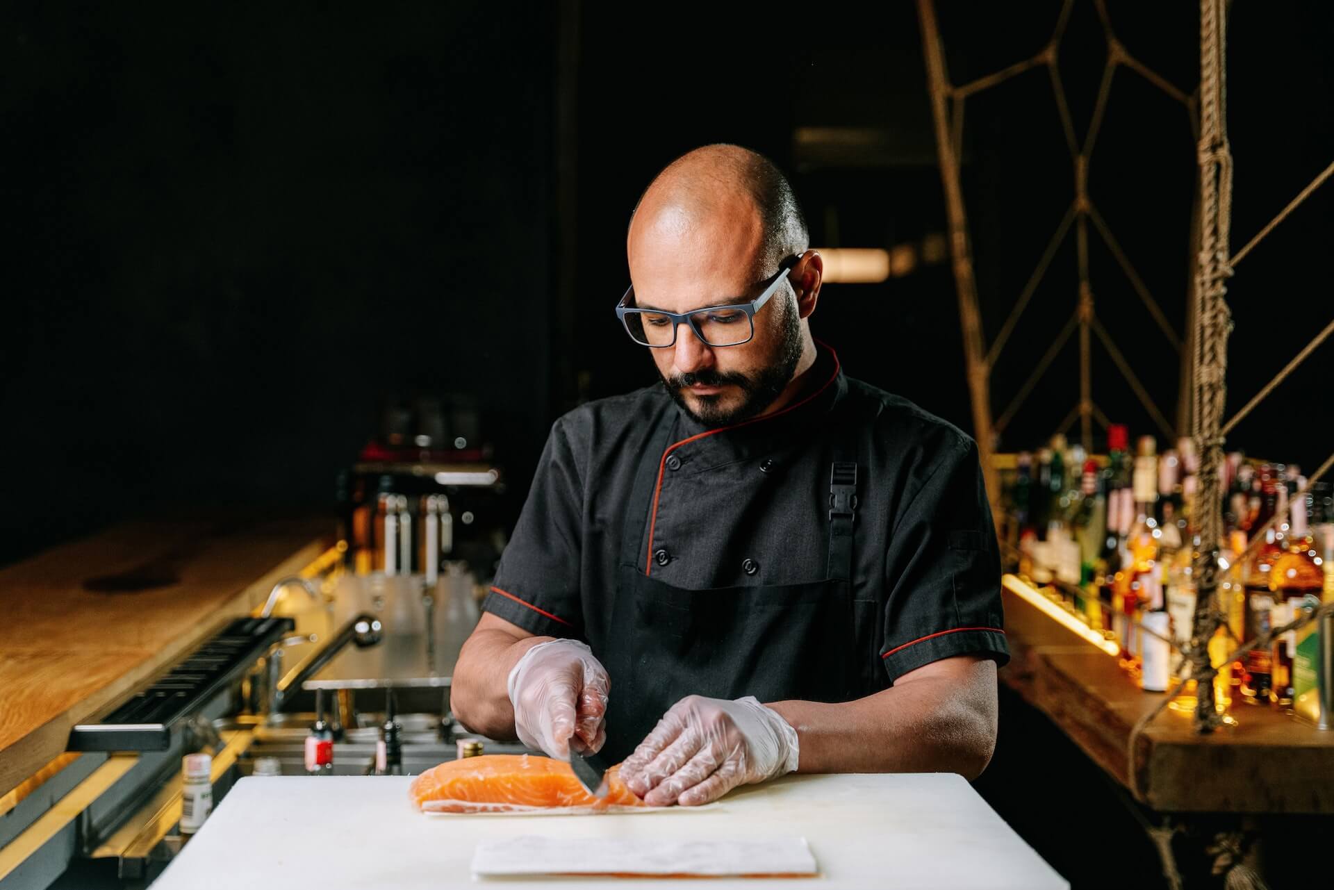 Chef cooking salmon
